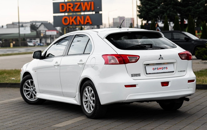 Mitsubishi Lancer cena 32900 przebieg: 150000, rok produkcji 2014 z Radom małe 596